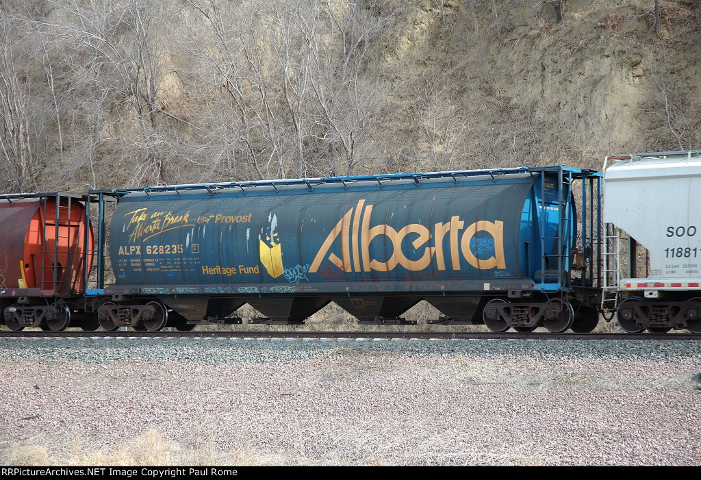 ALPX 628235, 4-Bay Center-Flow Covered Hopper eastbound on the UPRR